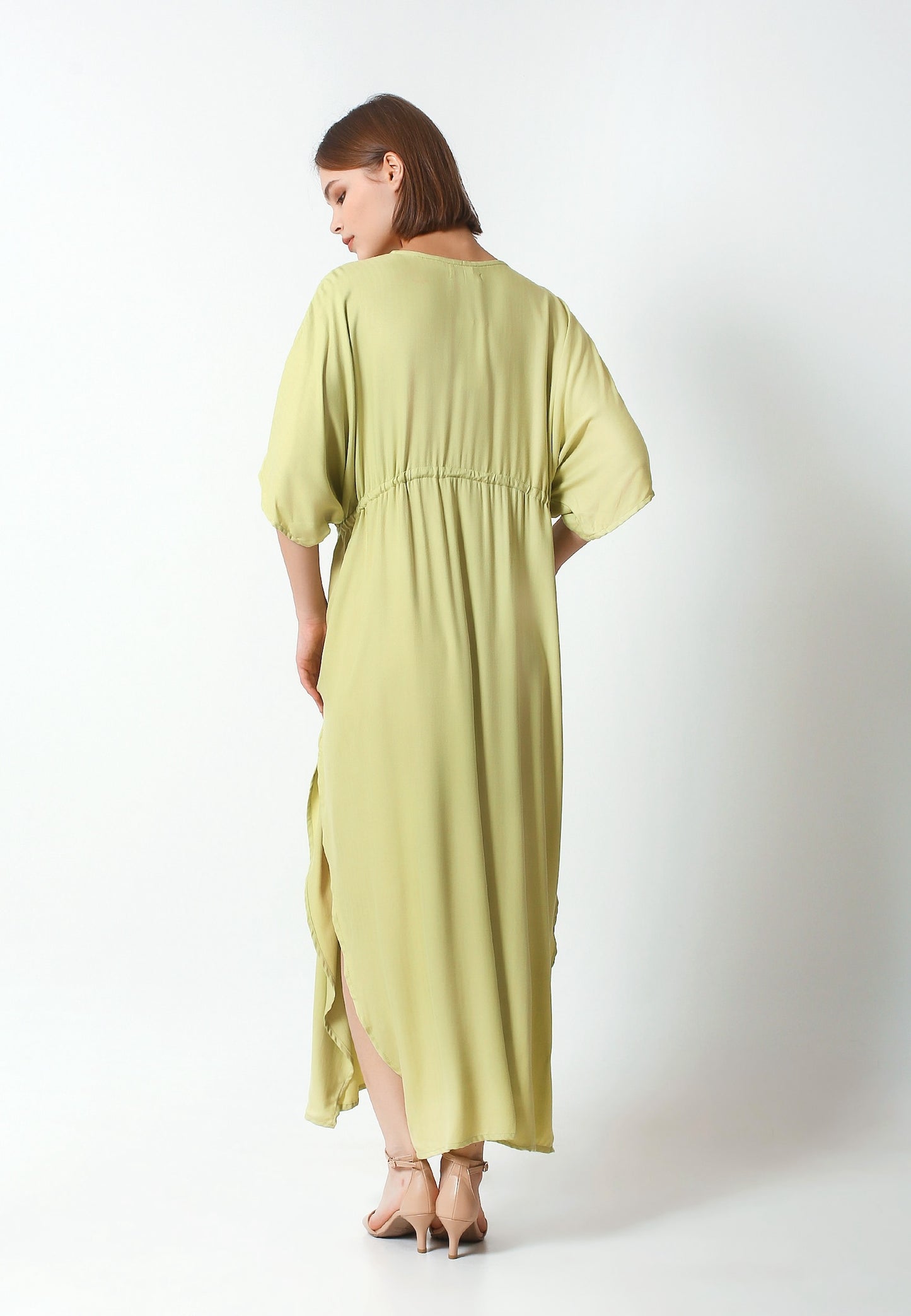 Sustainable Style: Crafted from eco-friendly rayon viscose, this kaftan embodies our commitment to sustainability without compromising on style or quality. Versatile Elegance: Available in a variety of solid colors, the Patricia Kaftan effortlessly transitions from day to night, making it the ultimate vacation essential. Tropical Vibes: Embrace the carefree spirit of summer with its lightweight fabric and airy design, evoking the tranquil beauty of tropical paradise.