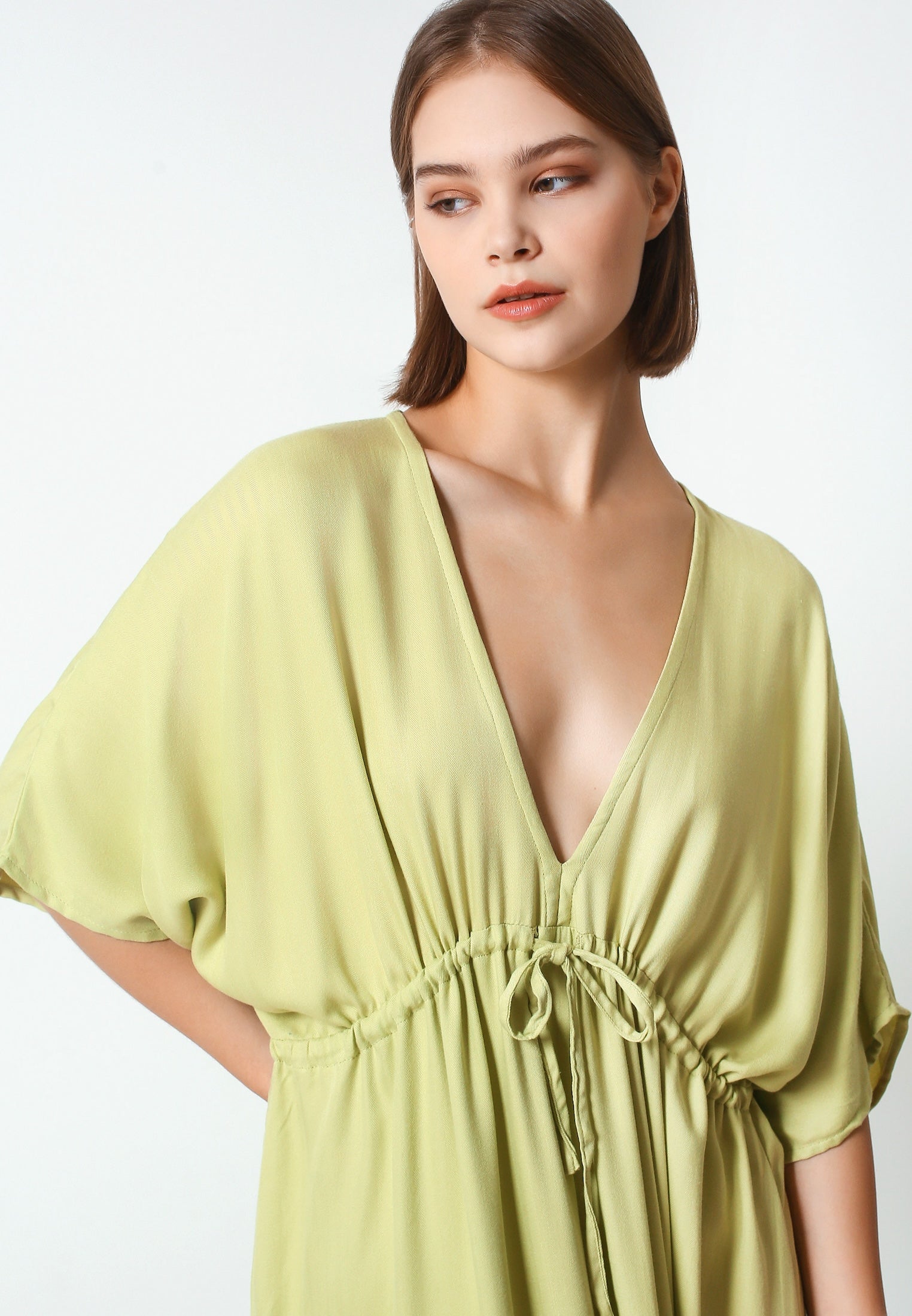 Sustainable Style: Crafted from eco-friendly rayon viscose, this kaftan embodies our commitment to sustainability without compromising on style or quality. Versatile Elegance: Available in a variety of solid colors, the Patricia Kaftan effortlessly transitions from day to night, making it the ultimate vacation essential. Tropical Vibes: Embrace the carefree spirit of summer with its lightweight fabric and airy design, evoking the tranquil beauty of tropical paradise.